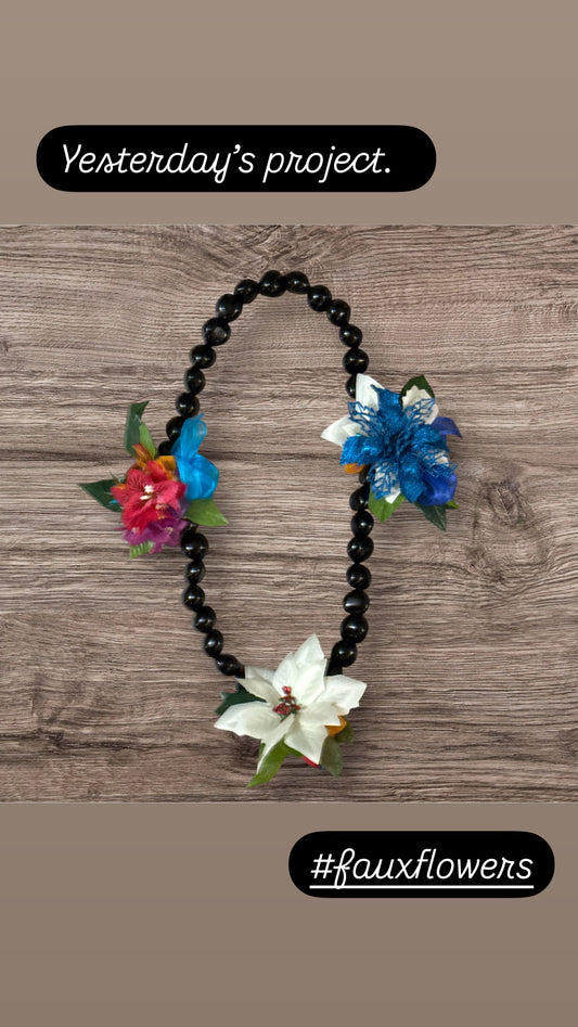 Faux flower kukui nut lei